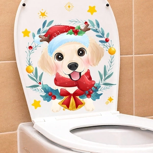 Detail of Christmas toilet lid sticker featuring a golden retriever in festive wreath