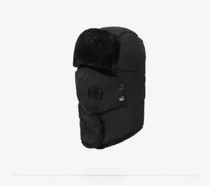 Detail of black winter trapper hat with protective face mask and warm fleece lining