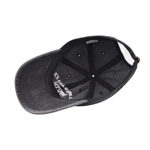 Internal view showing 100% cotton label and YOUTH embroidery on baseball cap