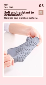 Close-up of flexible dark grey silicone heat resistant mat with anti-slip wave texture