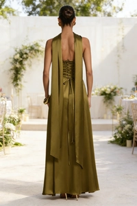 Detailed back view of olive green satin formal dress featuring elegant lace-up tie design