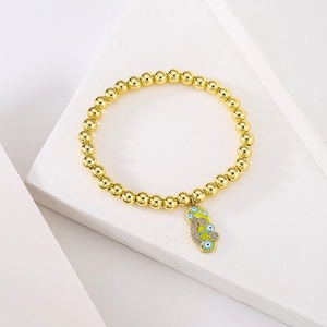 18K gold plated bead bracelet with a green enamel slipper charm featuring evil eye details