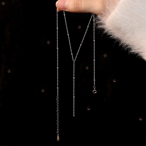 Elegant S925 sterling silver beaded tassel necklace with a minimalist aesthetic style
