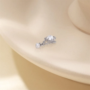 Macro detail of S925 silver earring with moonstone pendant and rhombic zircon link