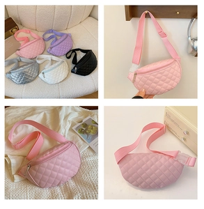 Detailed view of quilted waist bags in pink, purple, black, white, and silver colors