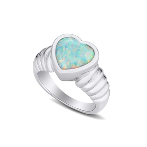 Detailed macro view of heart-shaped opal stone on a ribbed silver metallic ring band