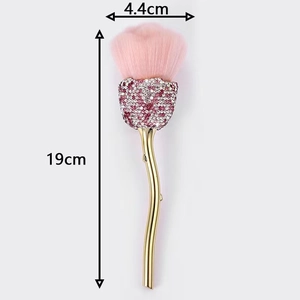 Rose shaped makeup brush with pink bristles and gold handle, size 19cm by 4.4cm