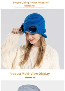 Detalle del gorro de punto azul real con gafas integradas y forro polar cálido