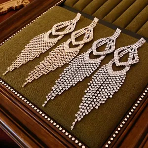Luxurious hollowed tassel drop earrings with sparkling rhinestones in gold and silver