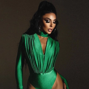 Detail of green long sleeve bodysuit with deep V-neckline and matching choker neck