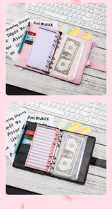 Close-up of A6 PU leather binder showing card slots and transparent budget pockets