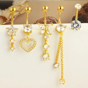Set of 5 gold belly rings with heart, flower and tassel designs with clear zircon stones