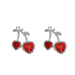 Detail showing red heart-shaped cherry charms with silver metal stems and crystal settings