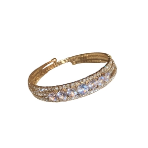 Luxury gold layered bracelet with sparkling round cubic zirconia and pavé settings