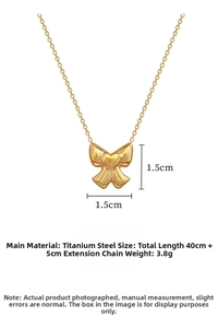 Gold bow necklace in polished titanium steel with 40cm chain and 5cm extension