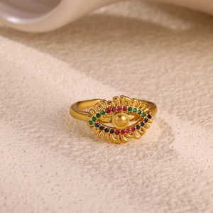 Macro shot of gold Evil Eye ring featuring colorful zircon stones and fine craftsmanship