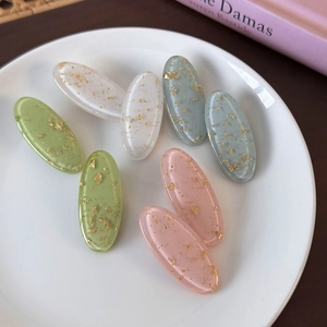 Colorful oval resin hair clips with gold foil flakes set of eight hair accessories