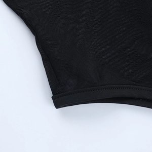 Detail shot of sheer black mesh fabric showing high-density grid and professional hem stitching