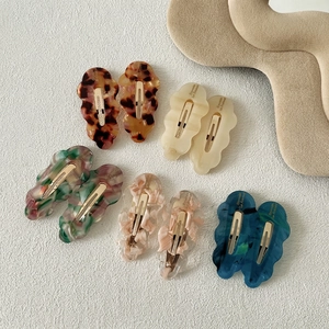 Barrettes à cheveux en acétate à bords ondulés motifs écaille et marbre pour femme