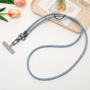 Blue denim crossbody phone lanyard with gray T-patch and black metal hardware setup
