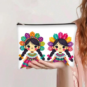 Detail view of a large canvas zipper pouch with cute cartoon girl prints and black zipper