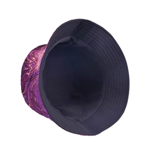 Reversible bucket hat with purple gold marble print and black inner lining for outdoors