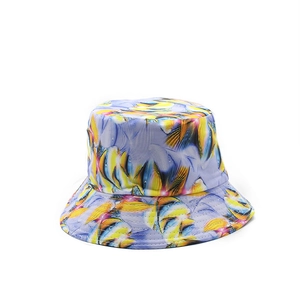 Double-sided bucket hat featuring colorful oil painting style abstract fish patterns