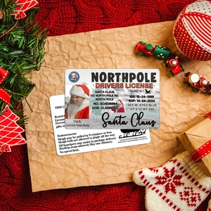 Detail view of two Santa Claus sleigh licenses on a festive holiday background