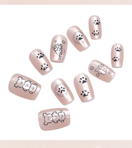Detail of 10pcs pink cat-eye press-on nails with cartoon bear and floral patterns