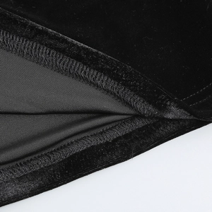 Detail of high-density double-stitch edging on premium black velvet short dress fabric