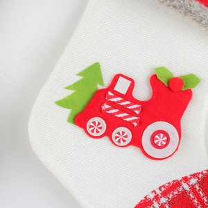 Christmas stocking with red train locomotive applique and white faux fur trim on top