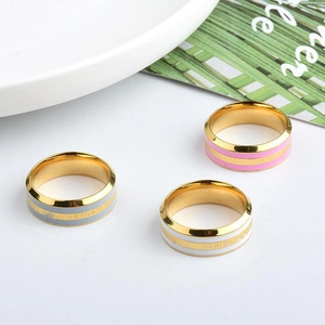 Minimalist gold-plated wide ceramic rings with colorful enamel bands in blue pink and white
