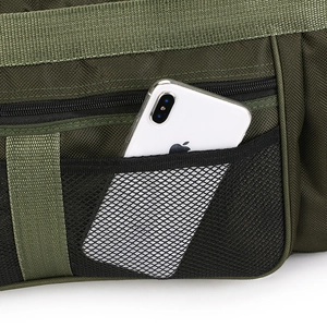 Detail of army green travel bag featuring a durable black mesh side pocket and zipper