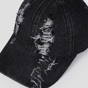Distressed black denim baseball cap with vintage frayed holes for men and women