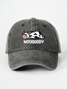 Detail of MOOOOODY embroidery on dark gray washed cotton baseball cap with cow graphics