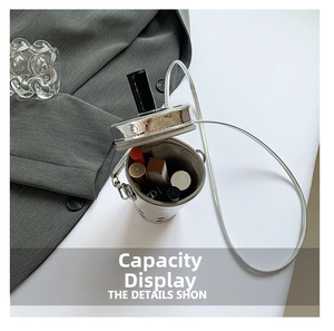 Top view of shiny silver bubble tea bucket bag showing interior space with lipsticks