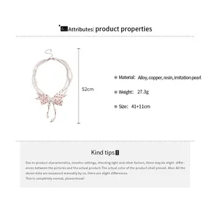 Detailed size chart for the multi-layer pearl necklace with a polka dot bow pendant