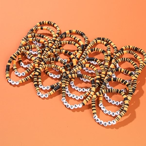 Halloween beaded bracelet set with BOO and SPOOKY text in orange and black tones