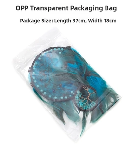 Detailed view of blue feather dream catcher with tree of life charm in OPP packaging