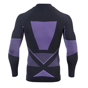 Detail of back compression zones and purple breathable knit on sports base layer