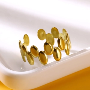 Irregular geometric gold-plated stainless steel open ring featuring oval link design