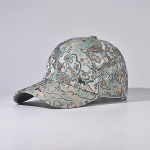 Detailed macro view of high-quality jacquard fabric on the silver-grey baseball cap