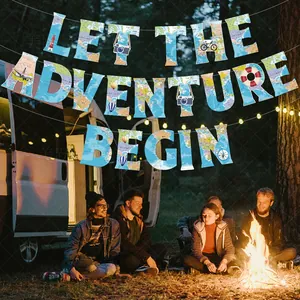 Outdoor camping scene with Let The Adventure Begin world map banner for travel theme parties