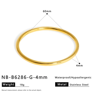 Technical view showing 60mm diameter and 4mm thickness of a gold stainless steel bangle