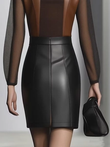 Rear view of black high-waisted PU leather pencil skirt with side split detail