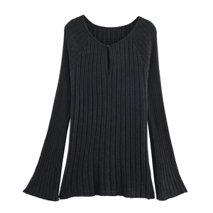 Detail of black ribbed knit top featuring water-drop cutout neckline and flared bell sleeves
