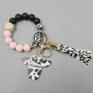 Silicone beaded wristlet keychain with leopard cow print, Mama bull tag and tassel charm