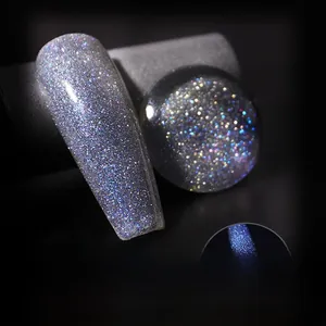 Macro shot of silver purple glitter nail gel polish with intense reflective diamond shine