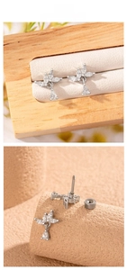 Detail of zircon teardrop stud earrings with secure stainless steel screw-back closure