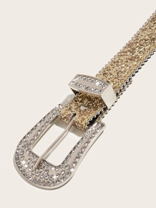 Detail of western Y2K glitter belt with rhinestone buckle and shimmering gold finish